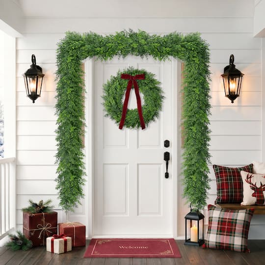 Puleo International 24" Unlit Green Polyethylene Spruce with Red Velvet Bow Artificial Wreath
